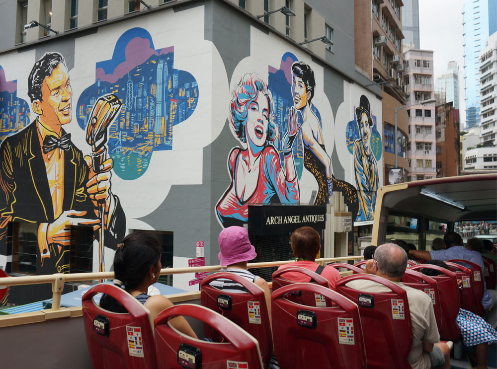 Passengers on board the bus tour in Kong Kong