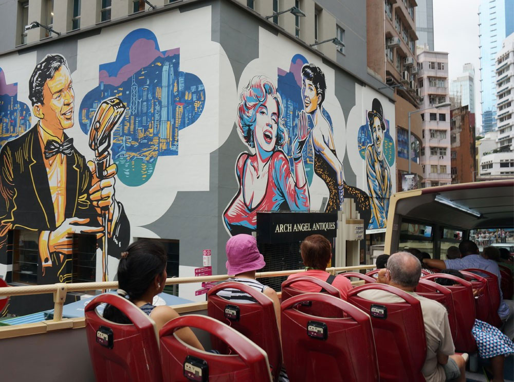 Passengers on board the bus tour in Kong Kong