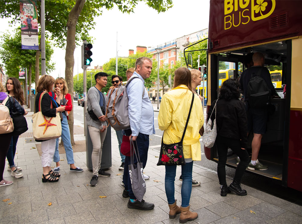 Passengers queuing for a Big Bus hop on hop off tour