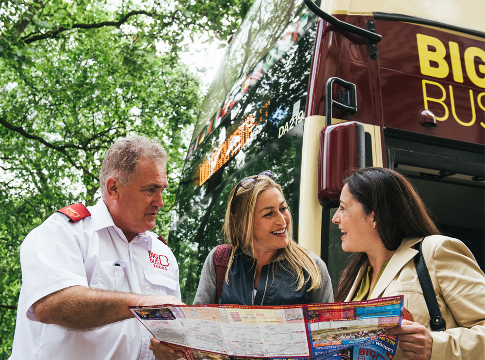 Big Bus Tours staff member assisting customers