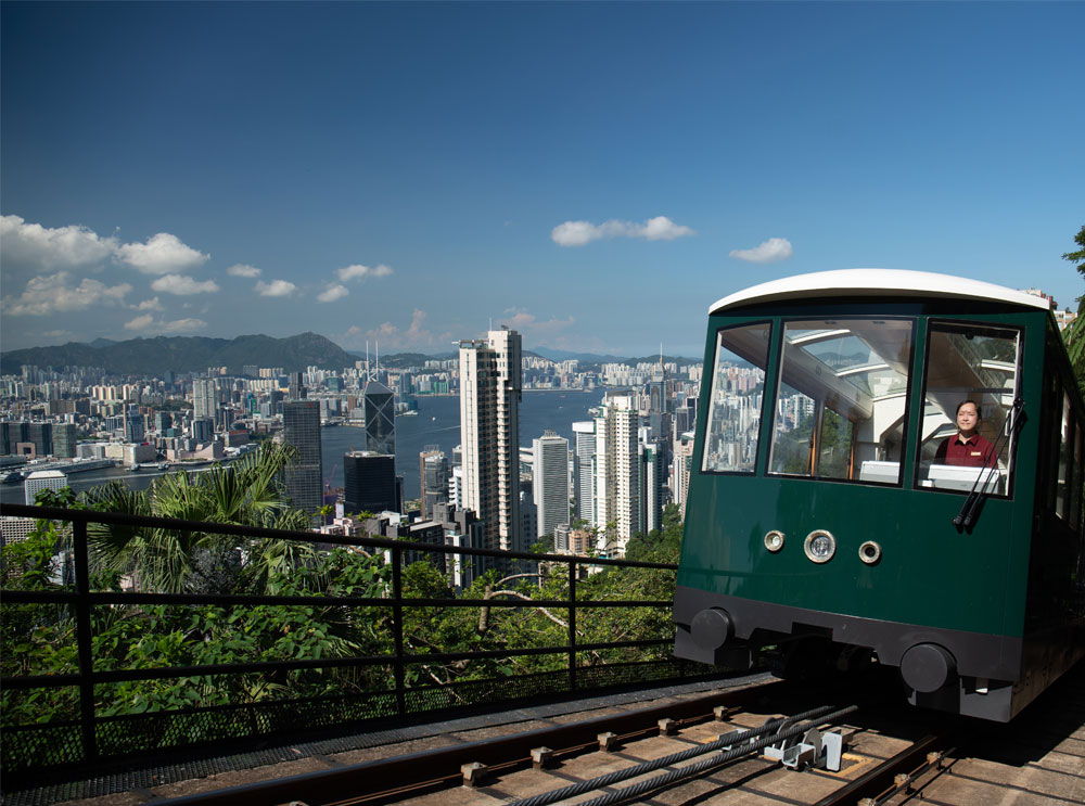 Peak Tram in Hong Kong going up a hill