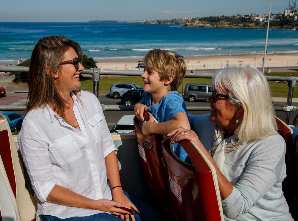 Mother, Son & Grandmother on the top deck of Big Bus Tours Sydney in Bondi