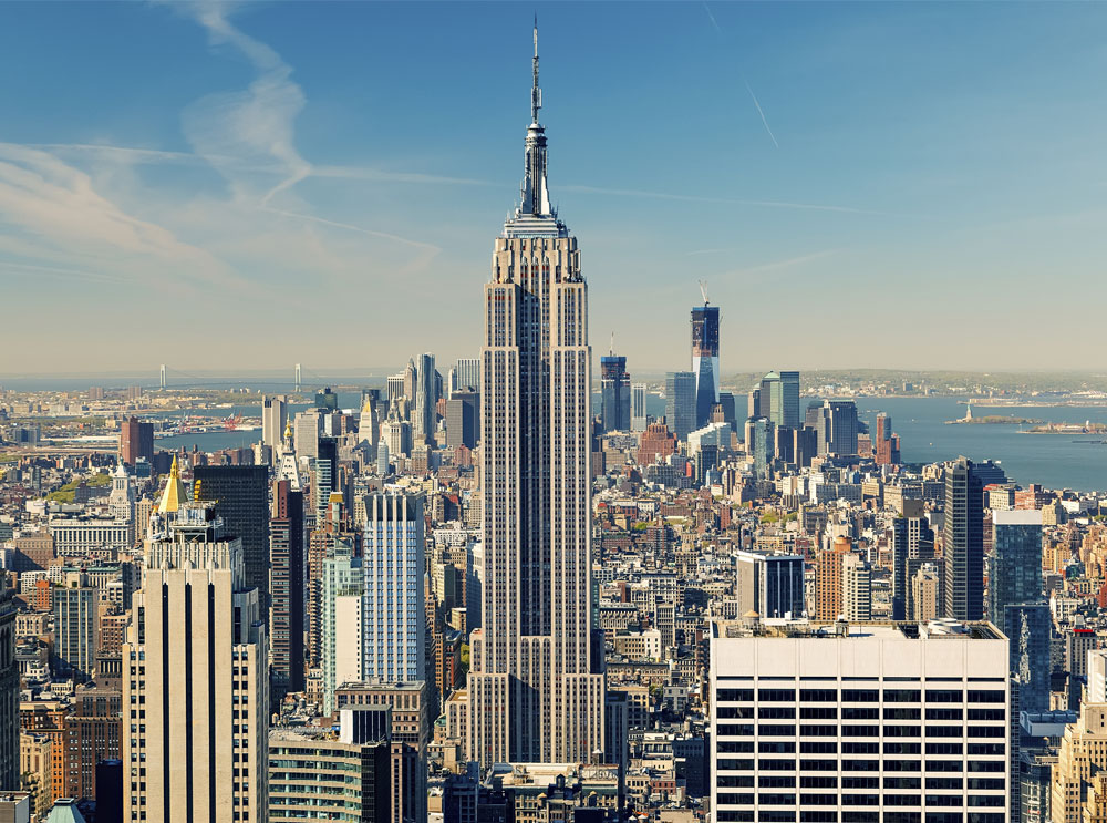 The Empire State Building amongst Manhattan skyline
