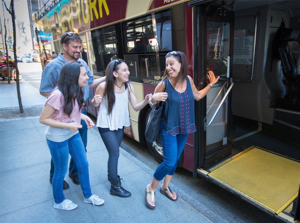 Family boarding a sightseeing tour
