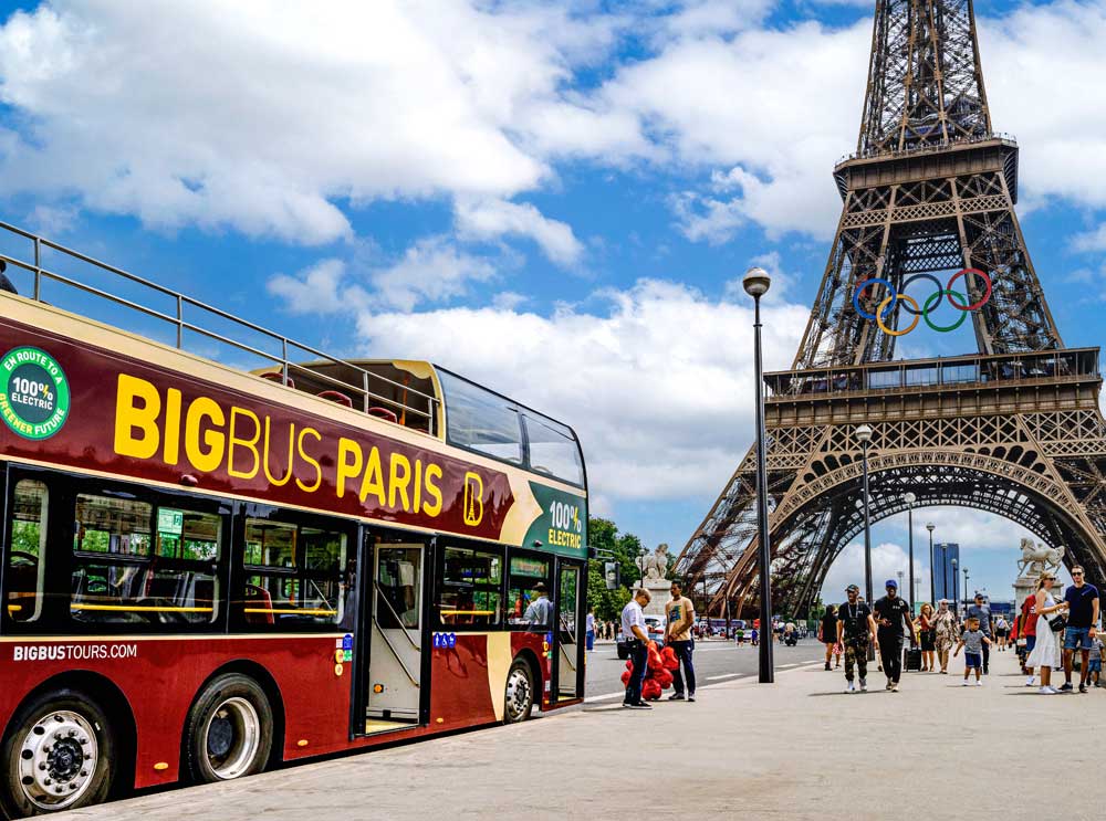 Big Bus Tours Paris parked near the Eiffel Tower