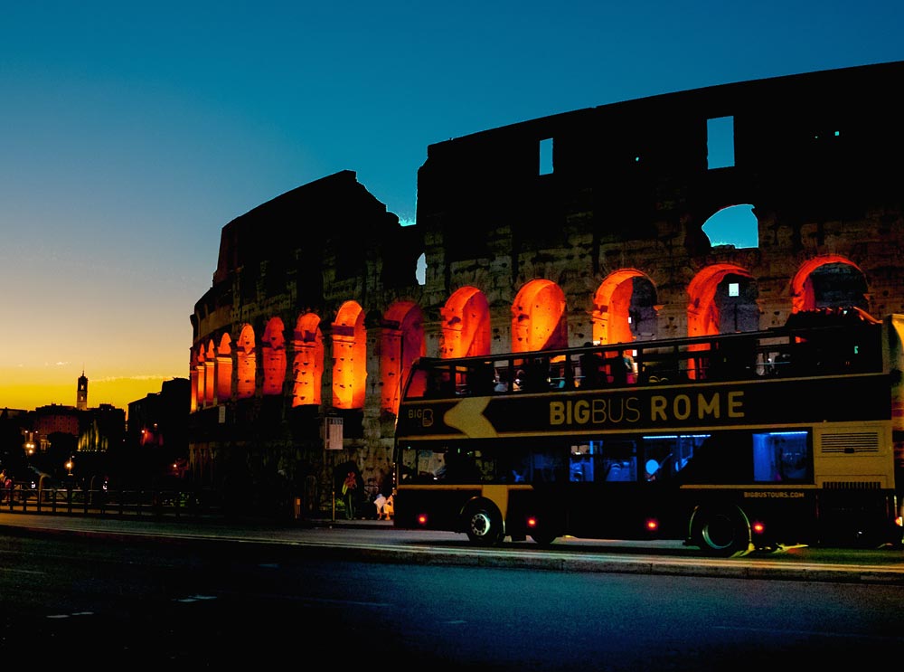 The Big Bus Christmas Evening Tour in Rome driving past the Colosseum