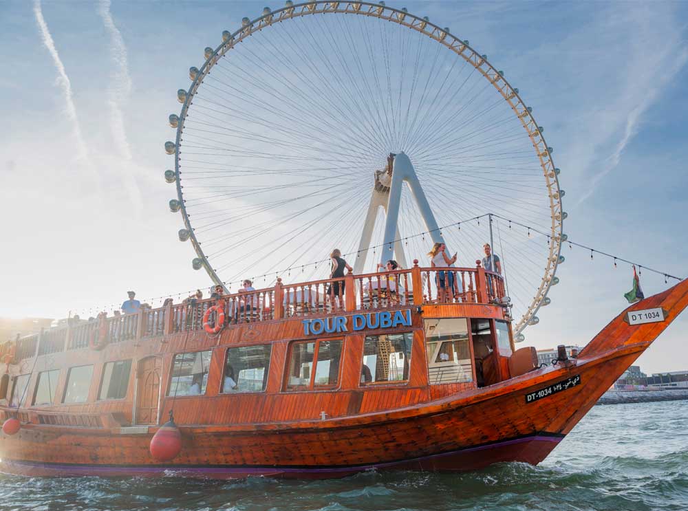 The Marina Dhow cruise passes Al Ain Observation Wheel