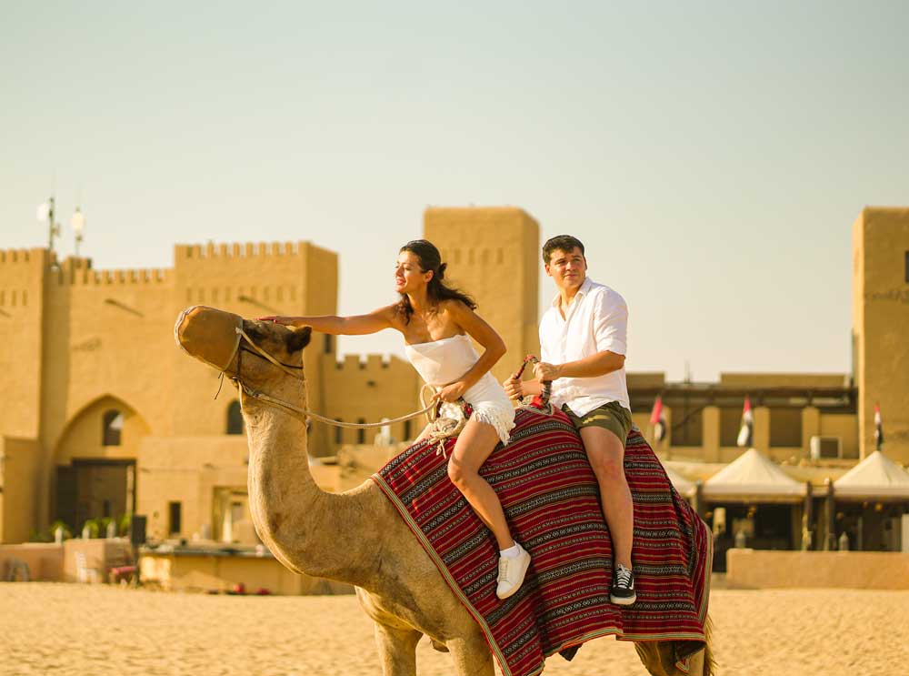 Couple on camel in Dubai