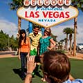 Big Bus Tours Las Vegas guests taking photos at the Las Vegas sign