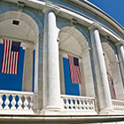 Big Bus Tours Washington DC Alrington Cemetary American Flags are hung around the Ampitheater located adjacent to the Tomb of the Unknown Soldier Blue Route