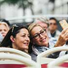 Friends taking selfie on a Big Bus Tour