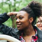 Woman listening to Big Bus Tours commentary