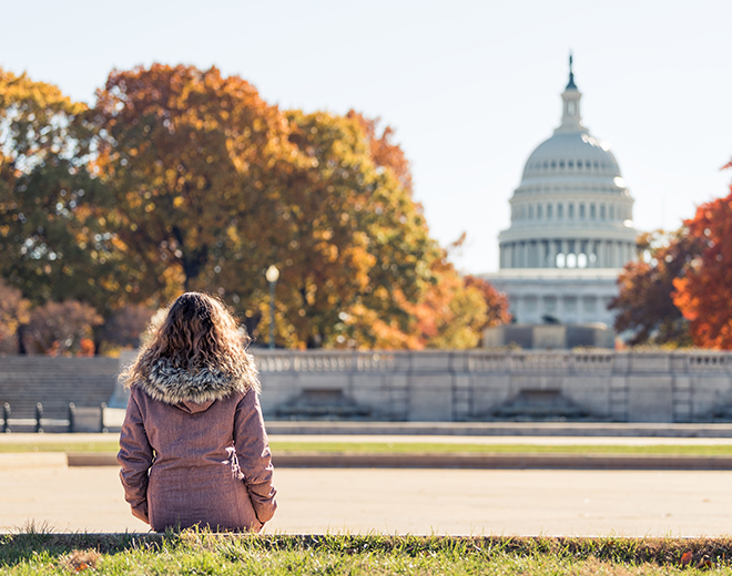 Lady looking up at Capitol Hill